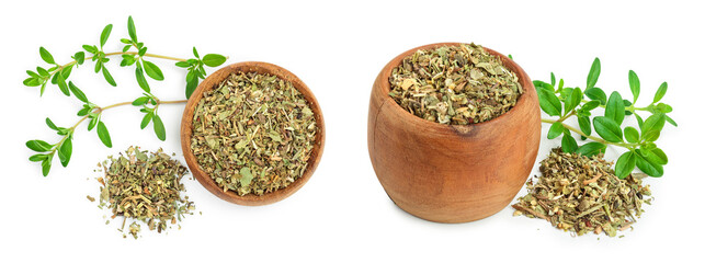 Dried thyme leaves in the wooden bowl, with fresh thyme isolated on white background. Top view