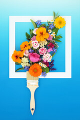 Surreal  paintbrush edible flower and herb splash bouquet composition with square frame. Creative minimal abstract nature health food design. On gradient blue white background.