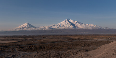 Fototapeta na wymiar Panoramic view of snow capped biblical mount Ararat in winter at early morning, Armenia