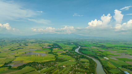 Valley with river and farmland in the countryside. Hinigaran River. Negros, Philippines