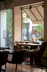 empty restaurant table with chairs and tables