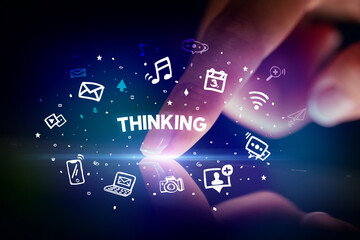 Finger touching tablet with social media icons concept