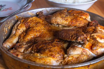 Hot Fried Chicken tobacco in a pan close-up