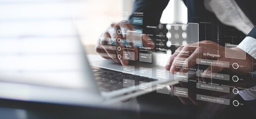 Business developer using Kanban board framework on laptop computer. Agile software development lean...