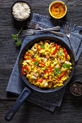 Chicken Paella with mushrooms, red pepper, spices