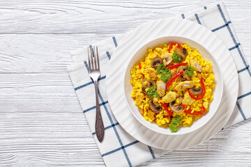 Chicken Paella with mushrooms, red pepper, spices
