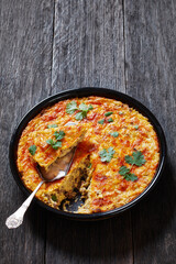 Cheesy Loaded Grits casserole with ground beef