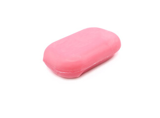 Pink soap bar. Isolated on white background. Side view. Selective focus.