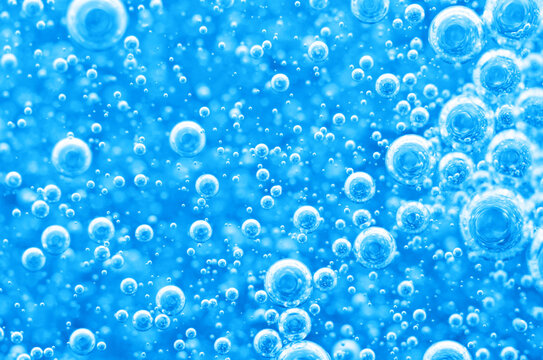 Underwater background of clean water with gas bubbles