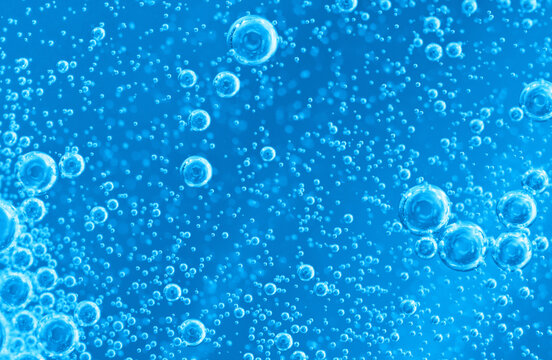Underwater background of clean water with gas bubbles