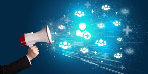 Young person with megaphone and social networking icon