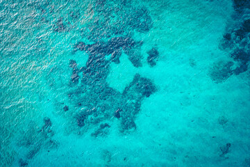 Beautiful drone view of the lake bottom of Lake Attersee, Upper Austria, Europe, with its crystal clear and turquoise greenish water