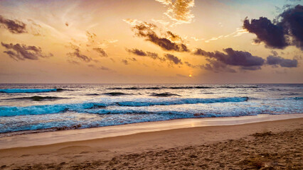 Naklejka na ściany i meble Sunset at the beach