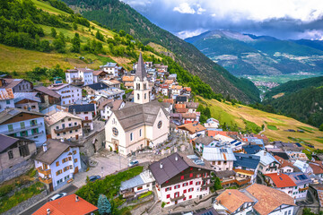 Fototapeta na wymiar Stelvio village or Stilfs in Dolomites Alps aerial view