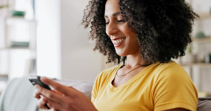 Smartphone, black woman scroll social media and communication, typing in chat and online while at home. Female relax in living room, technology and using phone with mobile app, email and contact