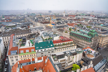 Fototapeta na wymiar Aerial view of Vienna central buildings on a cloudy summer day, Austria