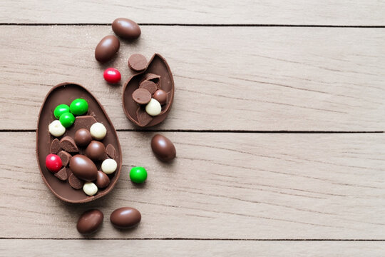 Chocolate day with colorful sweets and soda chocolate on top of wood