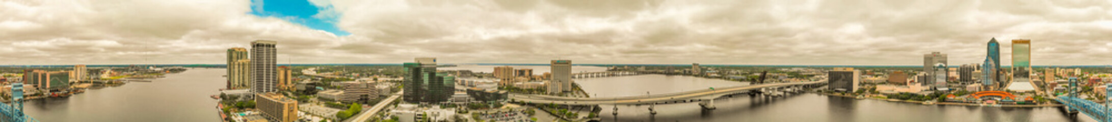 Jacksonville, FL - April 2018: Panoramic aerial view of the city with buildings and river