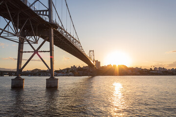 Fototapeta na wymiar paisagem com o pôr do sol ponte Hercílio luz de Florianopolis Santa Catarina Brasil Florianópolis