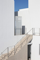 Concrete Staircase with white concrete wall