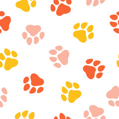 Seamless pattern with colorful big paws