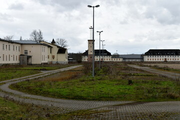 Fototapeta na wymiar Lost place, Old buildings of a former army barracks 