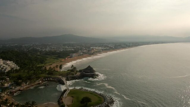 Aerial view sea beach kine in city Manzanillo, Mexico. Beautiful bitch and strong pacific ocean swell 