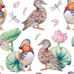 Watercolor seamless pattern with hand-painted elements of male and female mandarin ducks, dragonflies, and lotus flowers and leaves on a transparent background.