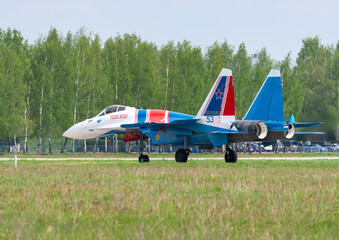 Moscow Russia Zhukovsky Airfield 25 July 2021: Aerobatic teams Russian Knights on planes Su-35 of the international aerospace salon MAKS-2021