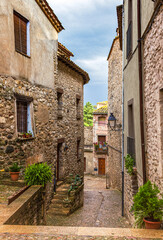 Fototapeta na wymiar Street in the medieval village Besalu, Catalonia, Spain