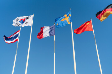 The national flags of six nations, Thailand, South Korea, France, Sweden, China, Germany