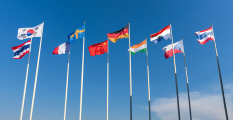 The national flags of nine nations, Thailand, South Korea, France, Sweden, China, Germany, Czech Republic, Netherlands, India