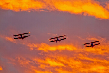 Biwing planes at sunset
