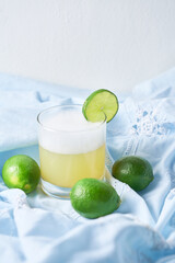 Homemade Pisco Sour Cocktail with Lime and Bitters