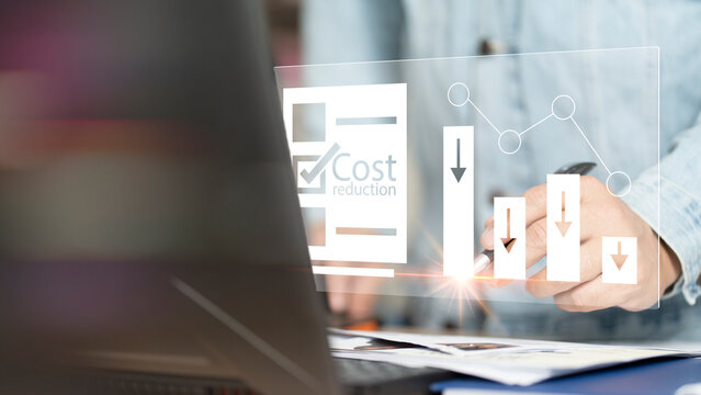 Cost reduction Concept. Businessman with his hand lowers the arrow of the graph. Cost text with a down arrow. budget,Cost Management. cut budget...
