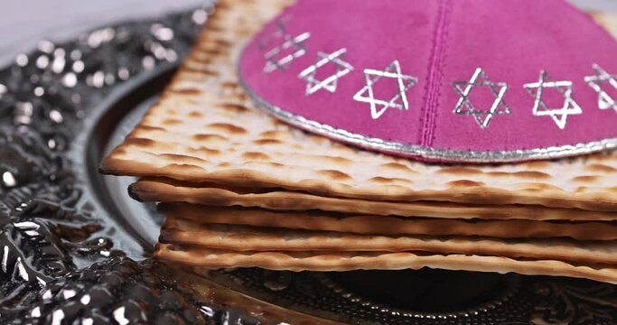 Unleavened matzah bread is kosher on Pesach Day celebration which commemorates Jewish holiday Passover