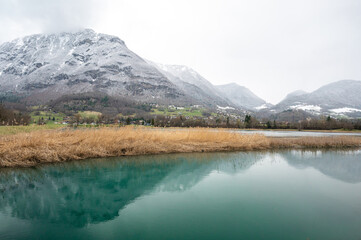 Snow Mountain reflection on blue lake