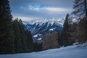 Fototapeta na wymiar The Dolomites mountains in beautiful winter day. Pinzolo ski resort, Italy. January 2023