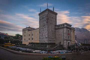 Fototapeta na wymiar The museum building in the Italian city Riva del Garda at sunset time. January 2023