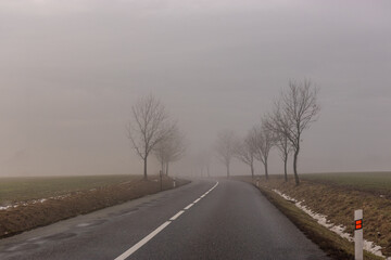 Winter view of a road in Orlicke hory mountains, Czech Republic