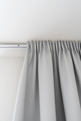 curtain hanging on ceiling rod in bedroom