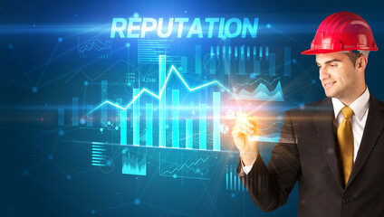 Young businessman with helmet drawing on virutal screen