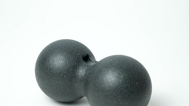 Double back massage ball, myofascial release, back muscle relaxation, self-massage.