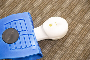 A CPR training class is conducted by a security guard in an office.
