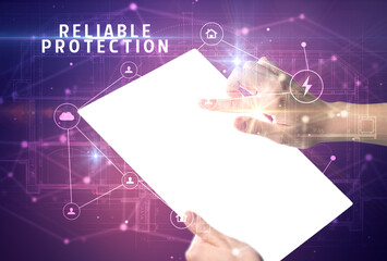 Holding futuristic tablet, security concept