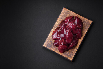 Fresh raw chicken, turkey or duck liver with salt, spices and herbs