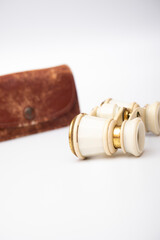 Opera theater binocularsAntique theater binoculars on a white background