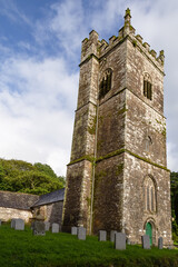 Fototapeta na wymiar Old 14th-century church tower of St Julitta's Church, a Grade II listed parish church in the Church of England Diocese of Truro in Lanteglos-by-Camelford, Cornwall.