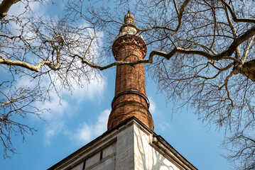 The minaret of the historical Ottoman Mosque. The historical mosque minaret in Bursa.
