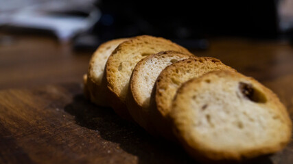 Pieces of dried round bread. Drying with raisins. Round dried bread. Dried baguette